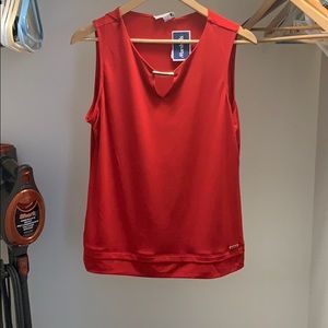 Red sleeveless blouse